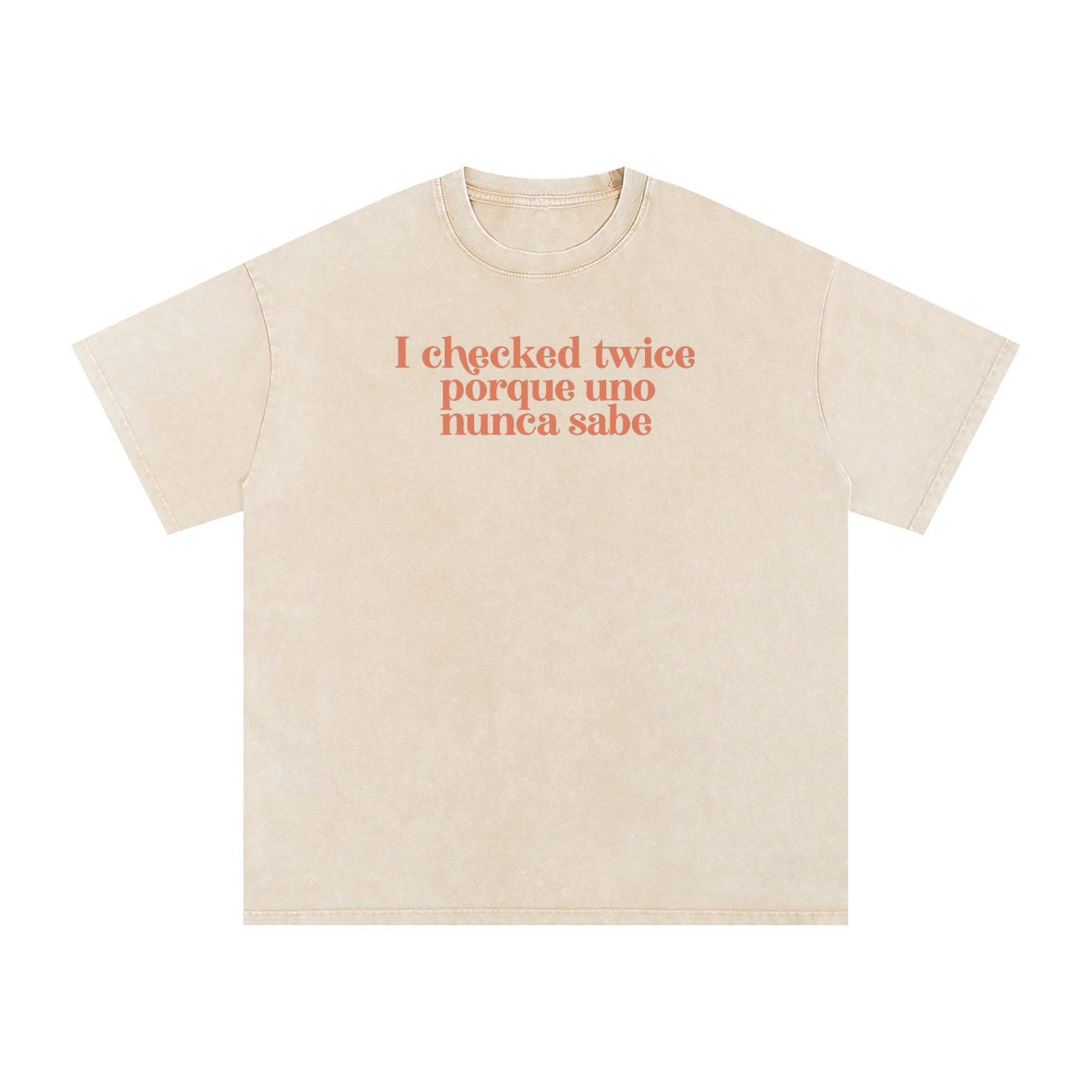 Apricot acid-washed oversized T-shirt with coral “I checked twice porque uno nunca sabe” text.