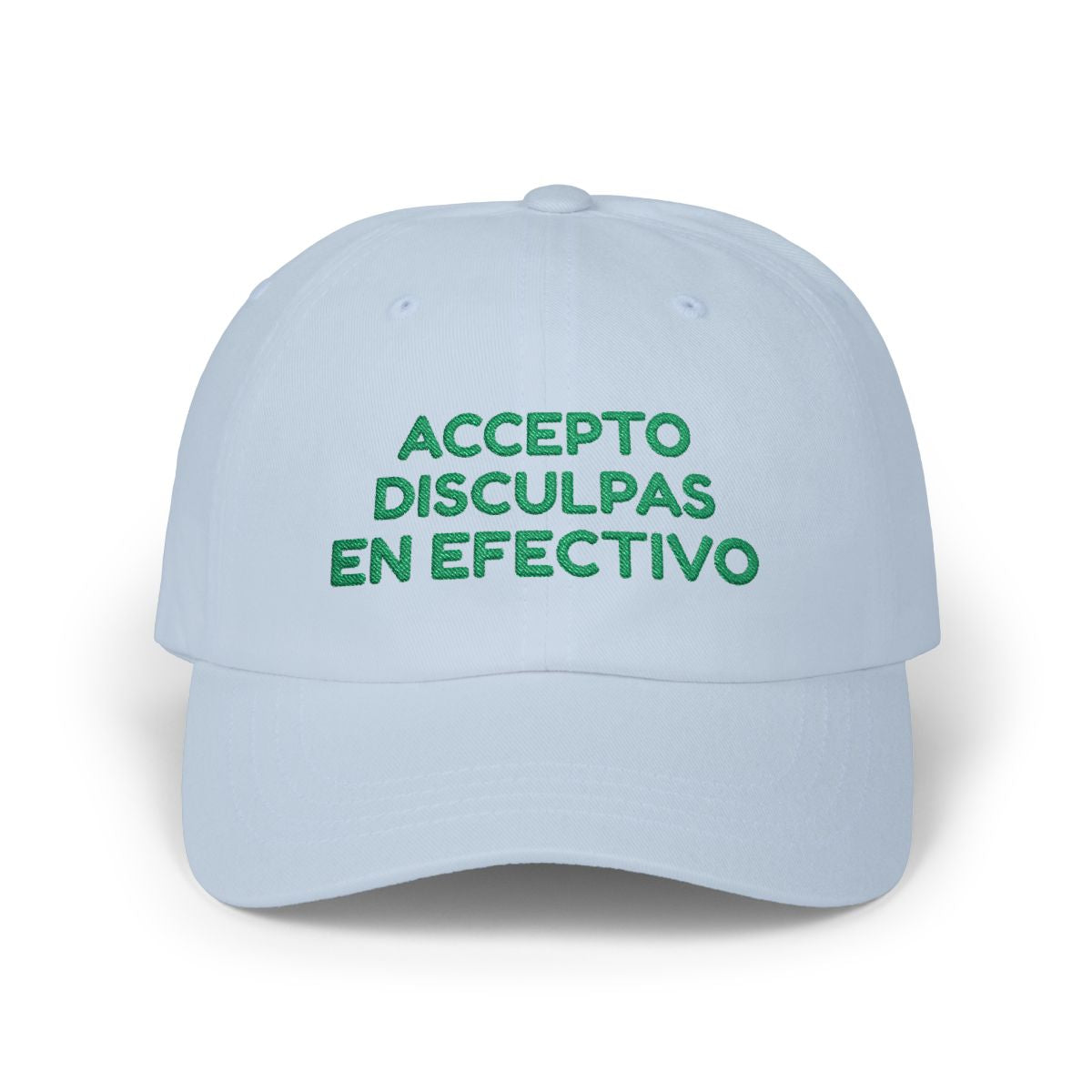Light blue dad cap with green “Accepto disculpas en efectivo” embroidery on a white background.