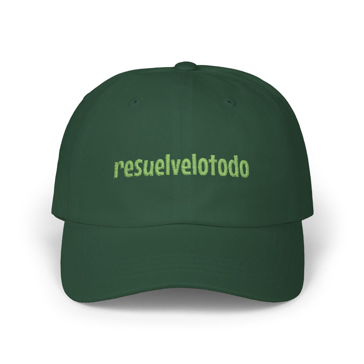 Dark green dad cap with light green “resuelvelotodo” embroidery on a white background.