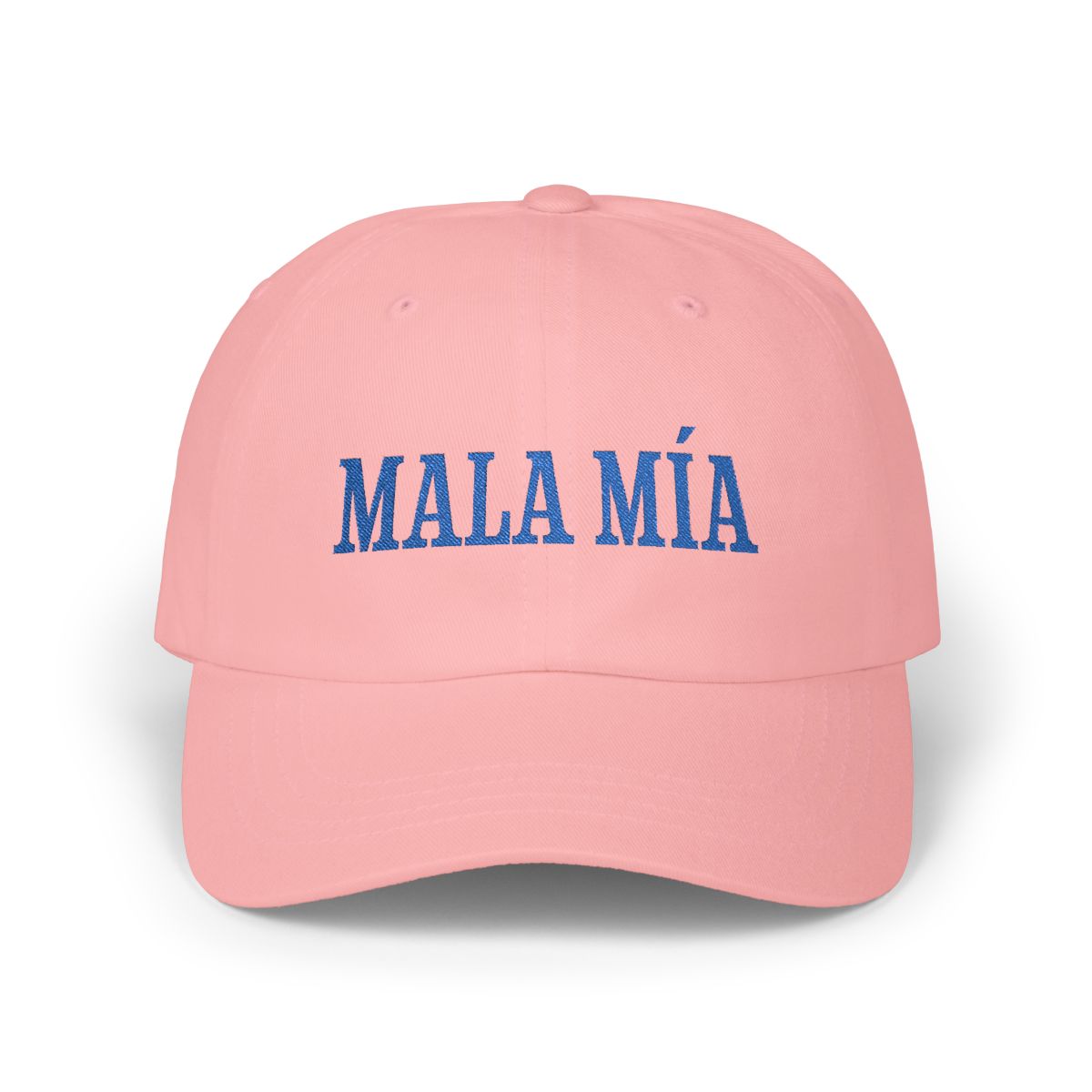 Pink dad cap with navy “Mala Mía” embroidery on a white background.