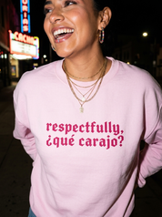Lifestyle editorial photo — Respectfully, ¿Qué Carajo? Embroidered Sweatshirt, Light Pink