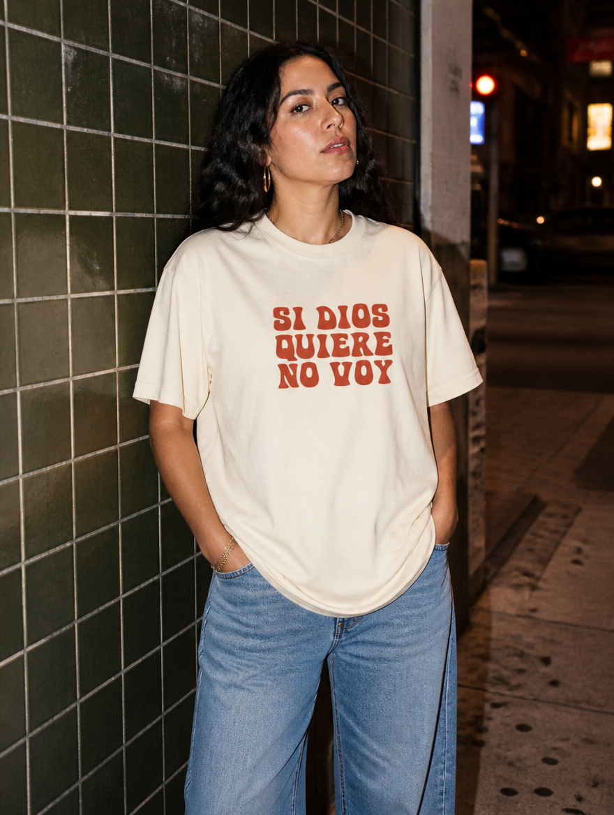 Lifestyle editorial photo — Si Dios Quiere, No Voy T-Shirt, Faded Cream