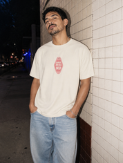Lifestyle editorial photo — Sorry, Pero No T-Shirt, Faded Cream