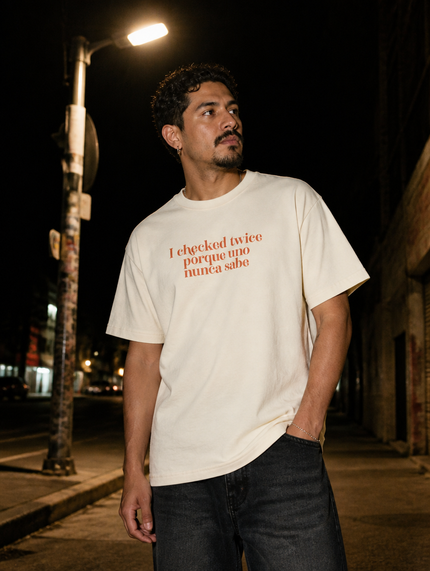 Lifestyle editorial photo — I Checked Twice Porque Uno Nunca Sabe T-Shirt, Faded Cream