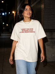 Lifestyle editorial photo — I Didn't Porque Mi Mamá Tuvo un Mal Presentimiento T-Shirt, Faded Cream