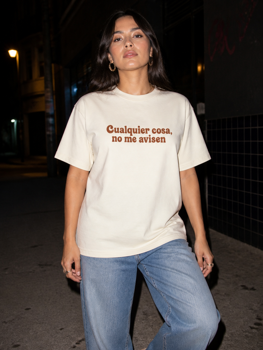 Lifestyle editorial photo — Cualquier Cosa, No Me Avisen T-Shirt, Faded Cream