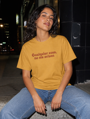 Lifestyle editorial photo — Cualquier Cosa, No Me Avisen T-Shirt, Faded Mustard